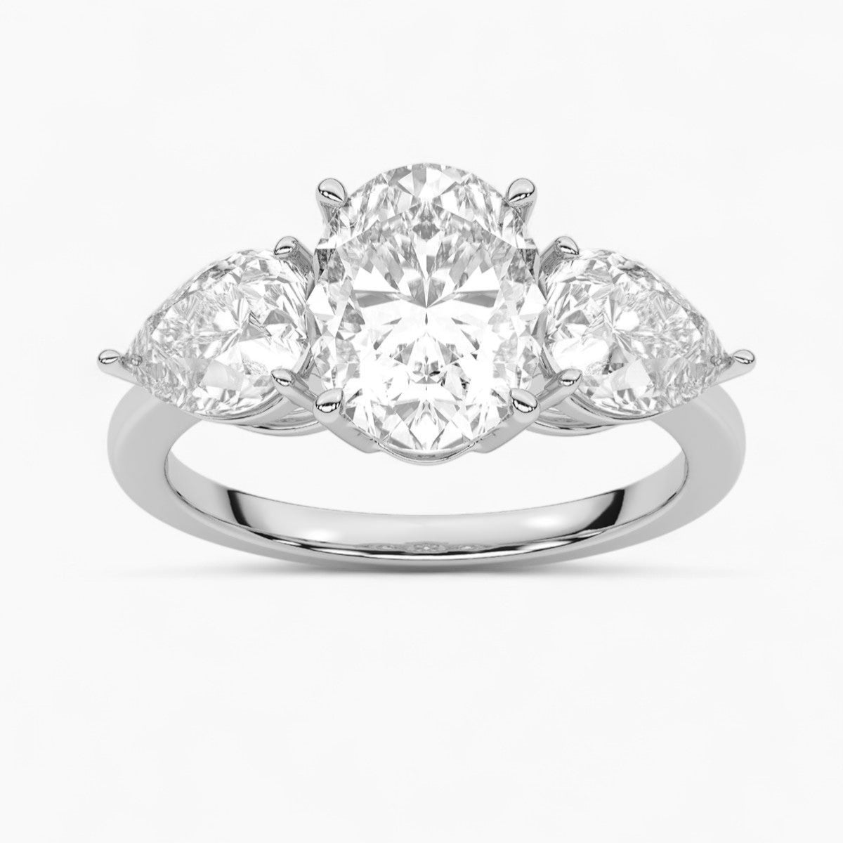 Pear Cut Three Stone Diamond Engagement Ring